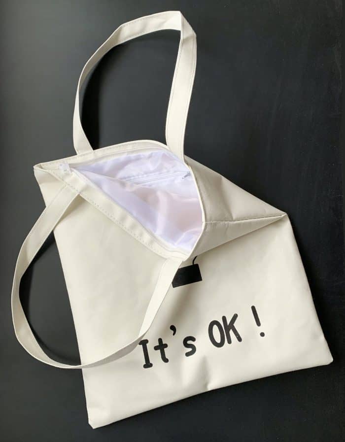 canvas bag with ok pattern details